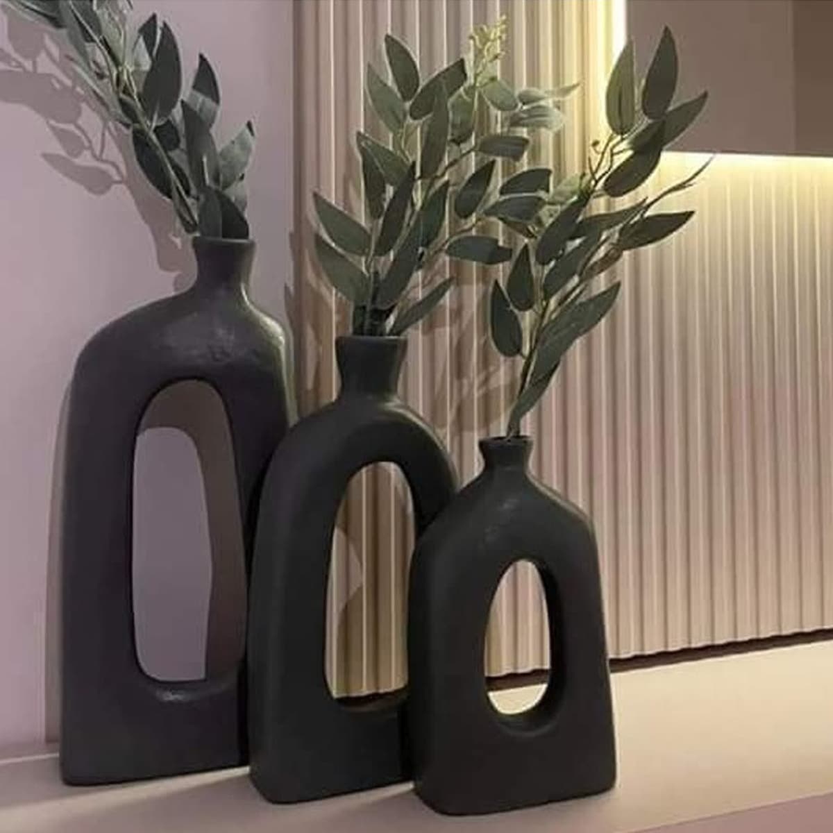 Black pottery vase set of 3, varying heights, matte finish