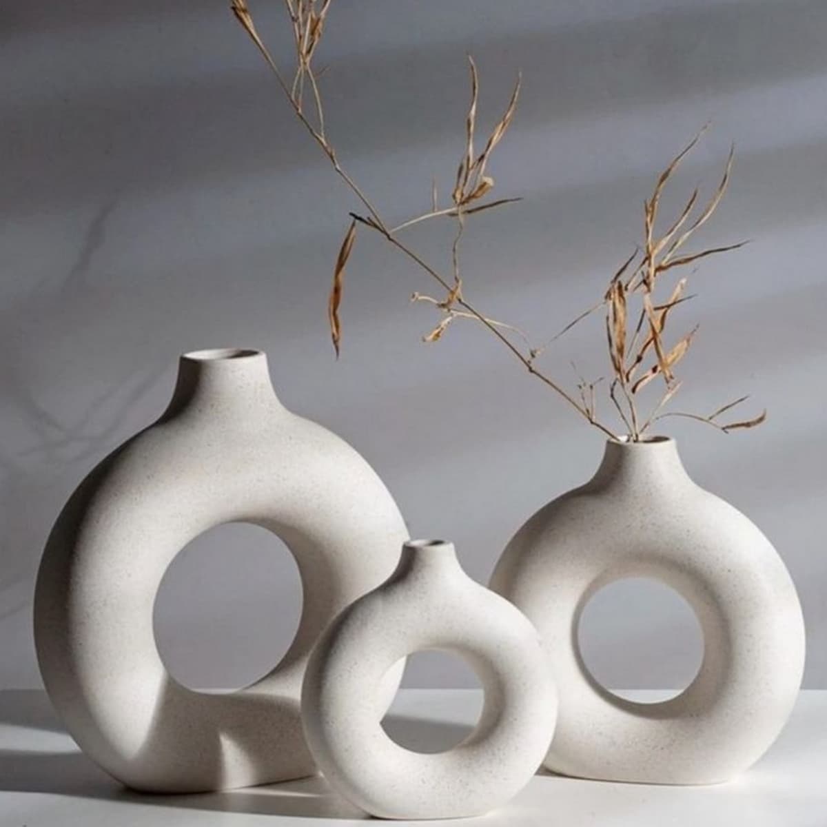 White pottery decorative vase set of 3, cylindrical graduated heights